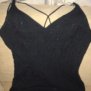 Dressy long, black dress with split in front just above the left knee.